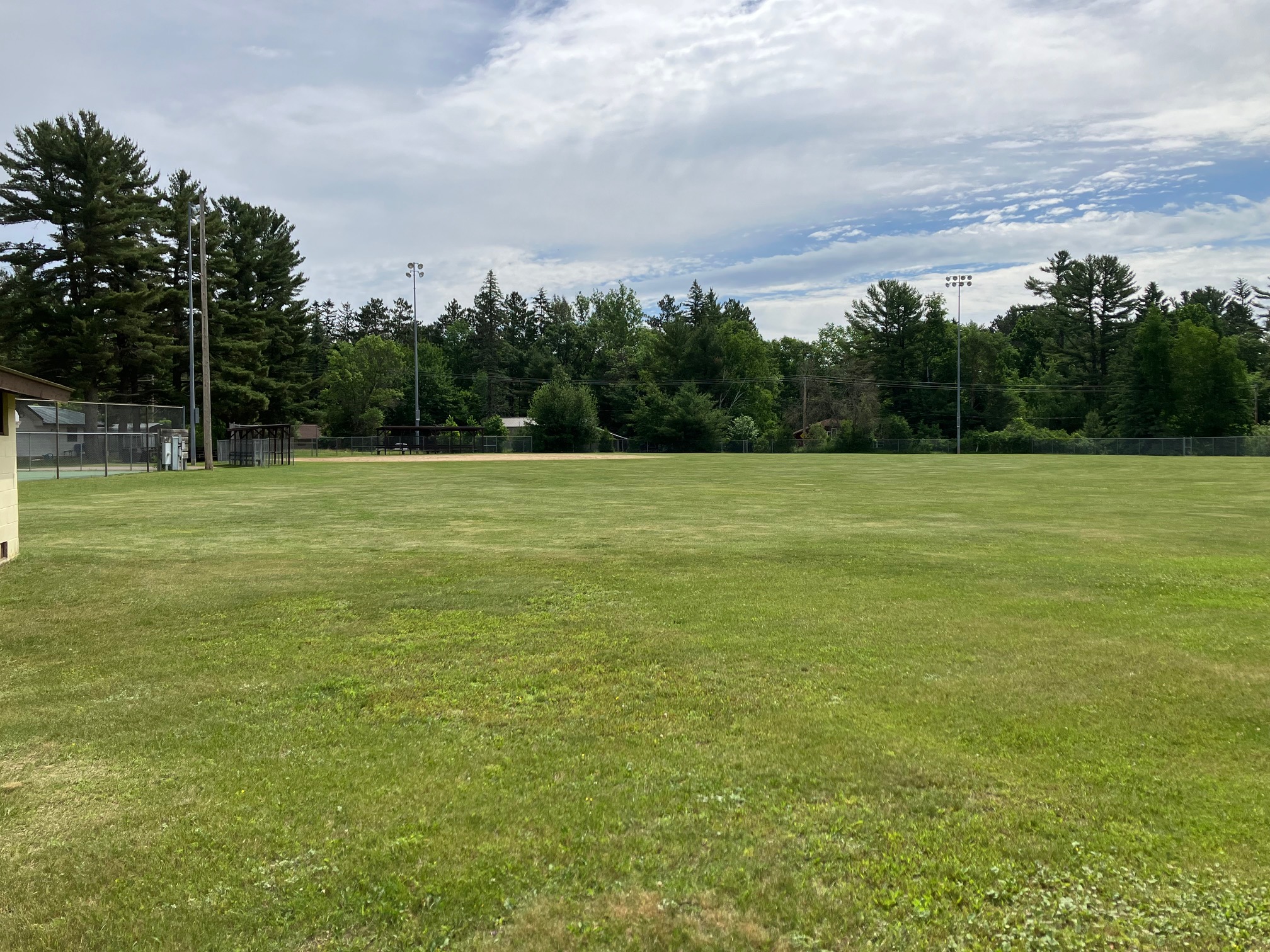 A wide green field in Hazelhurst Town Park